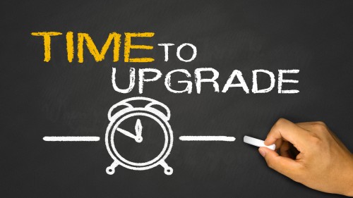 time to upgrade concept on blackboard background